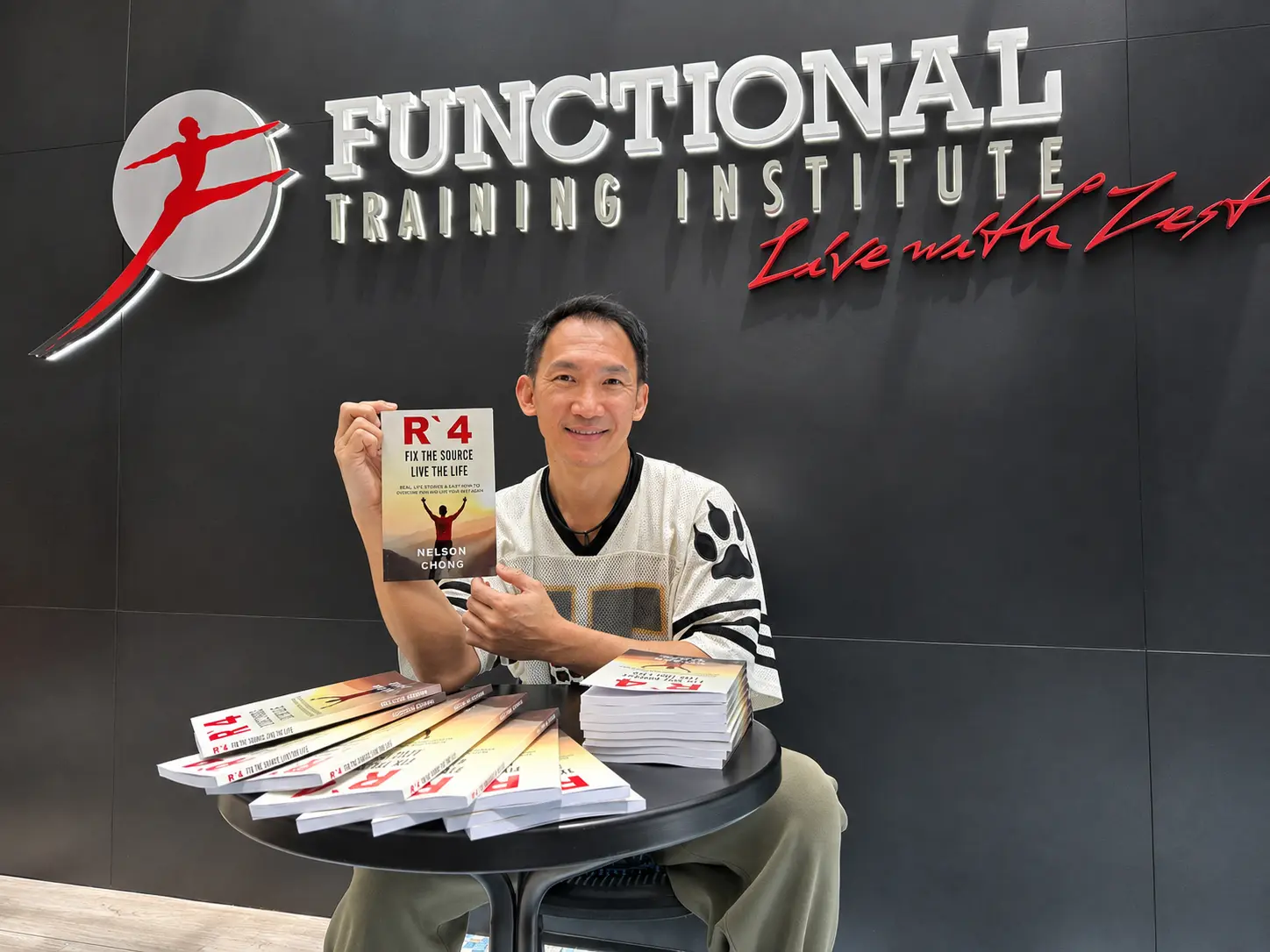 Nelson Chong with the R4 Amazon Best Seller book