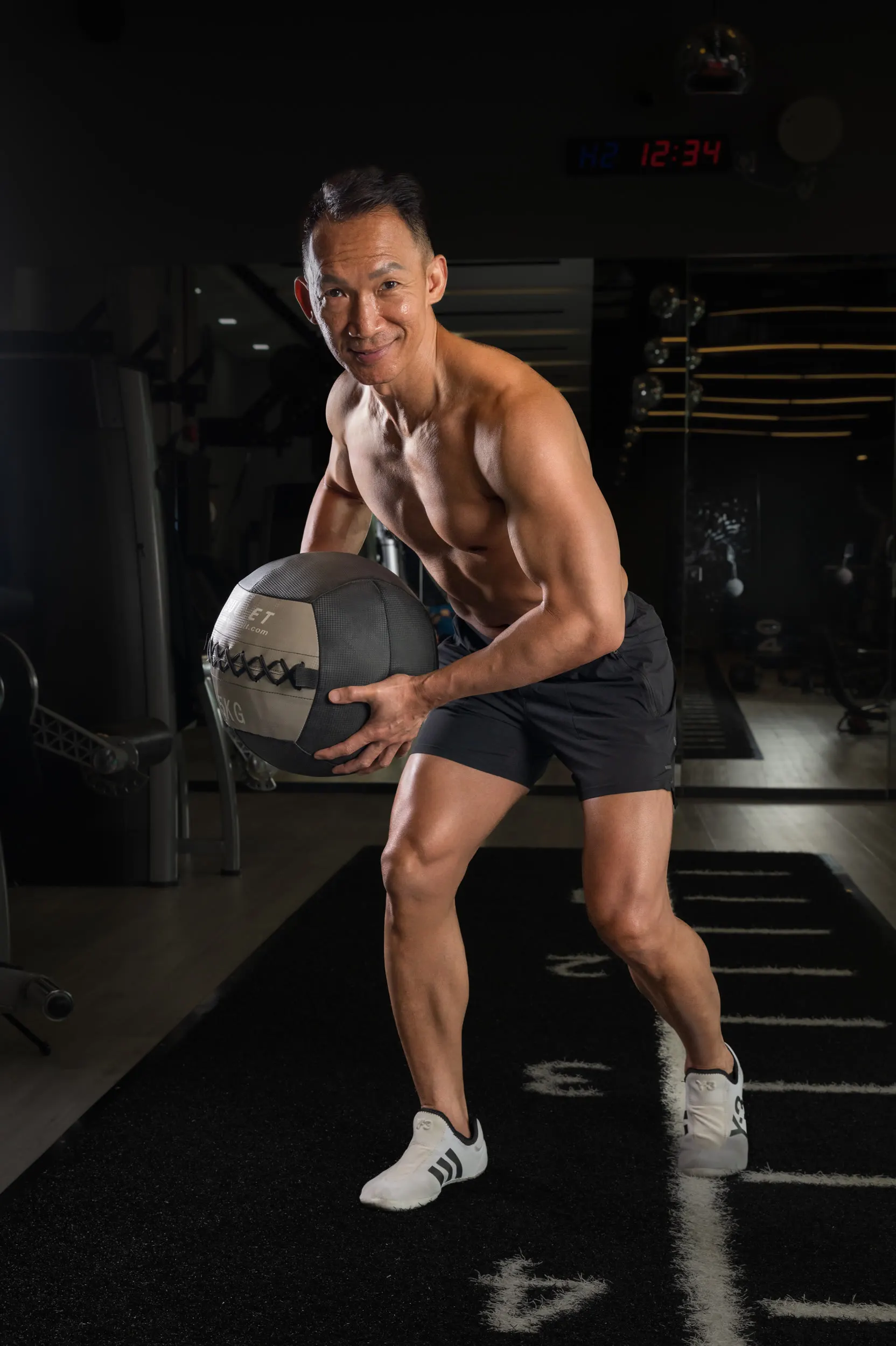 Nelson Chong training with a medicine ball at FTI