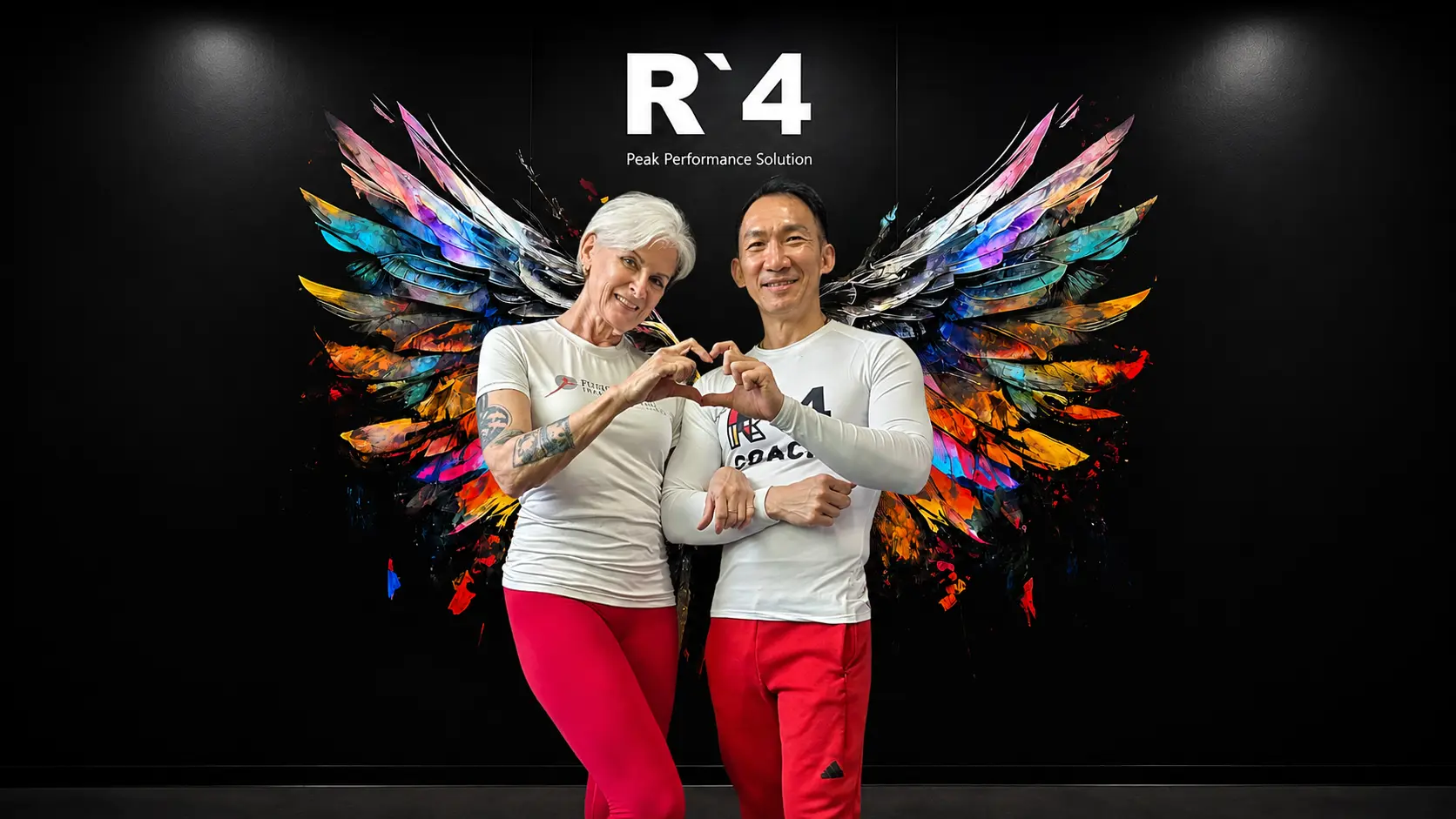 Carol and Nelson Chong celebrating her R4 results at the Kallang studio
